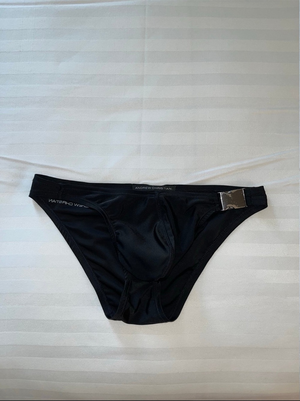 Andrew Christian Black Brief with Silver Buckle Accent. Buckle peeling. SMALL